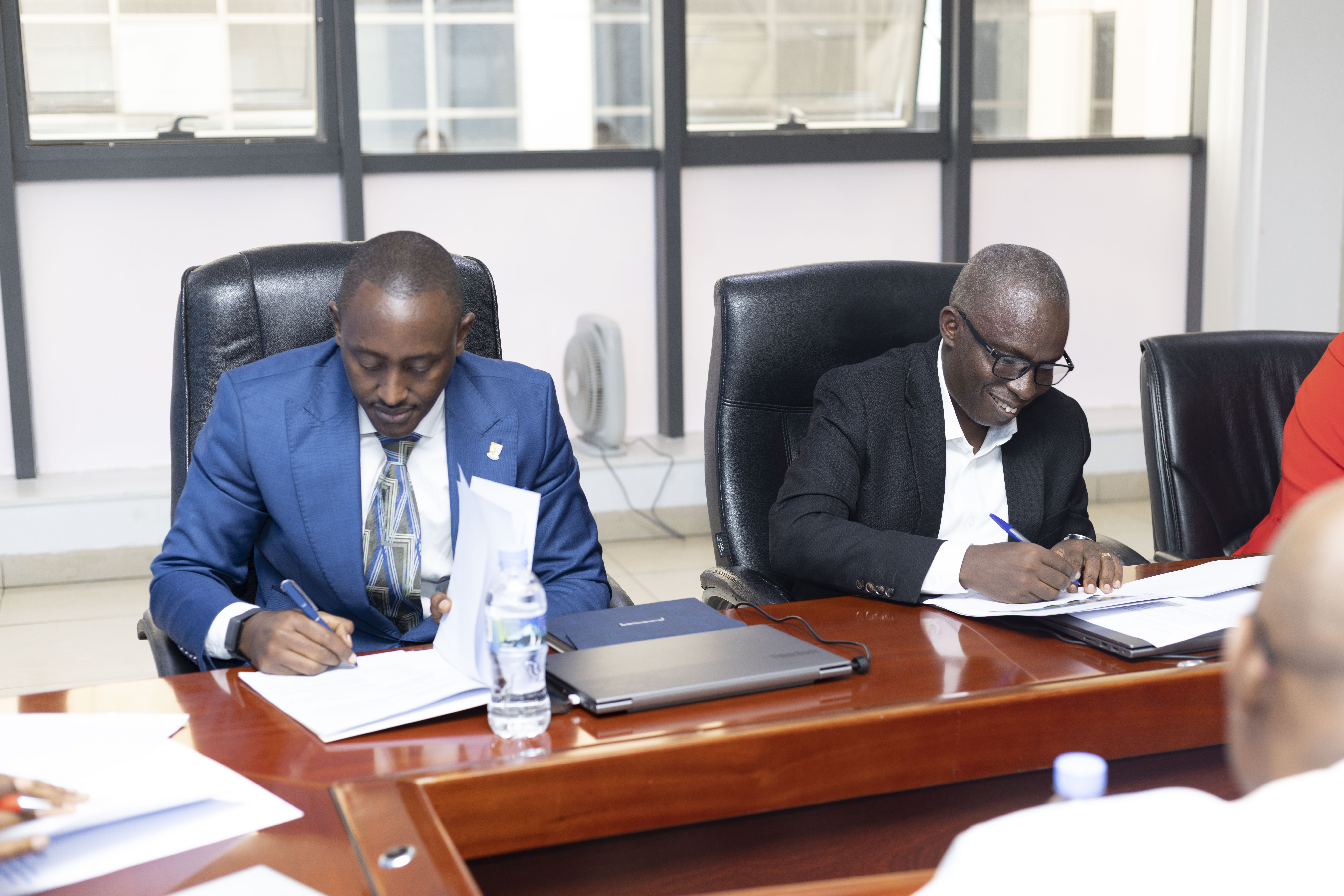 Bahige Jean Berchmas and Mwiseneza Maxime at the handover ceremony